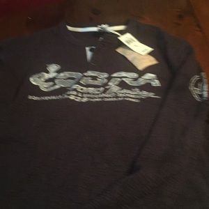 Men’s Henley reads Ford Cobra